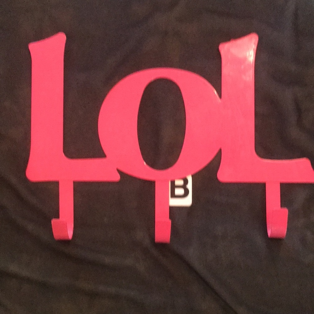 WALL HANGING “L O L”. Has built n hangers. Teens TWEENS & even n bath 2hang robe